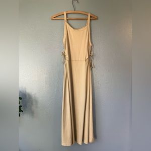 Beige dress with side cutouts
